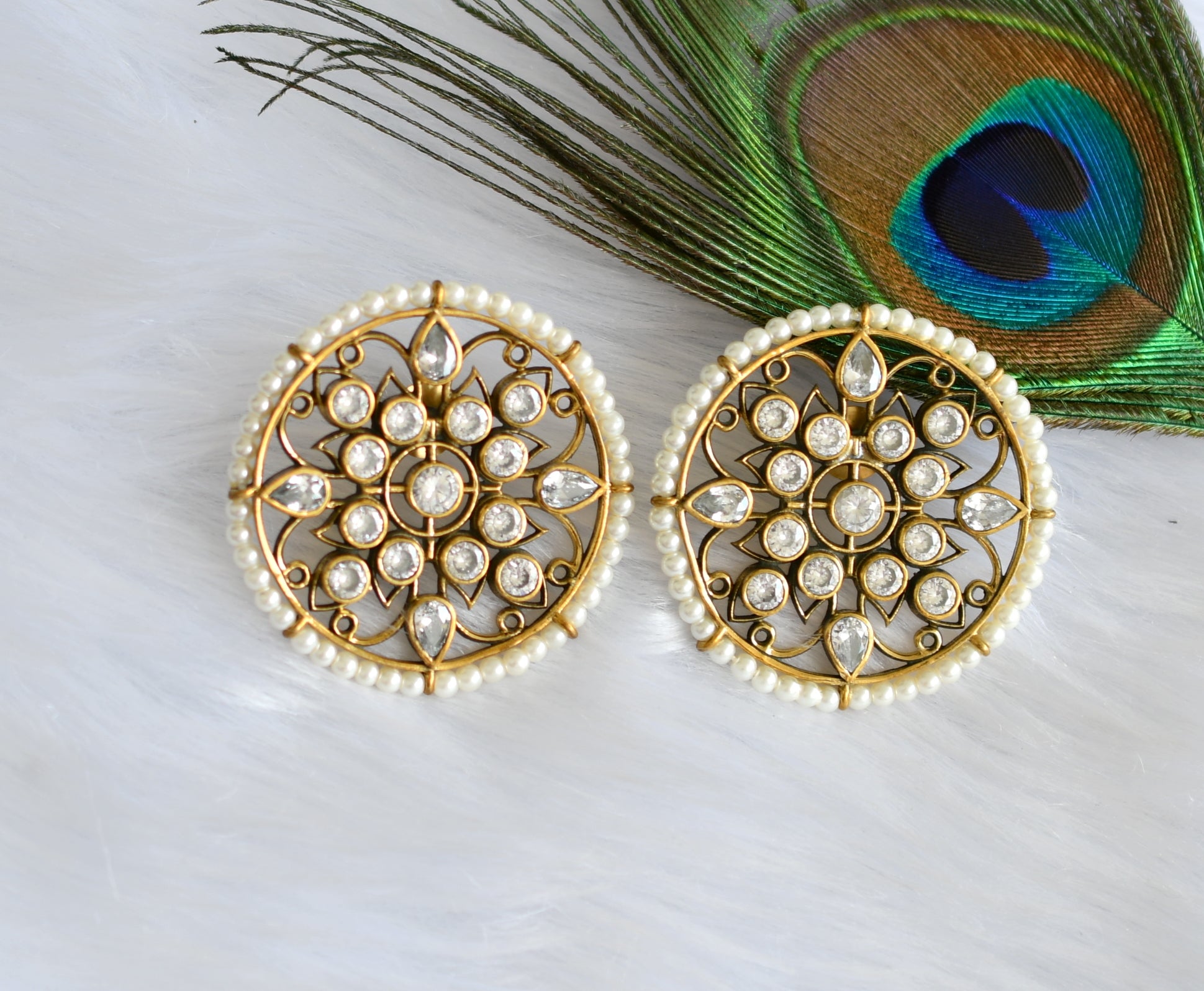 Buy Gold Plated Pearl Circular Stone Stud Earrings by Just Shradha's Online  at Aza Fashions.